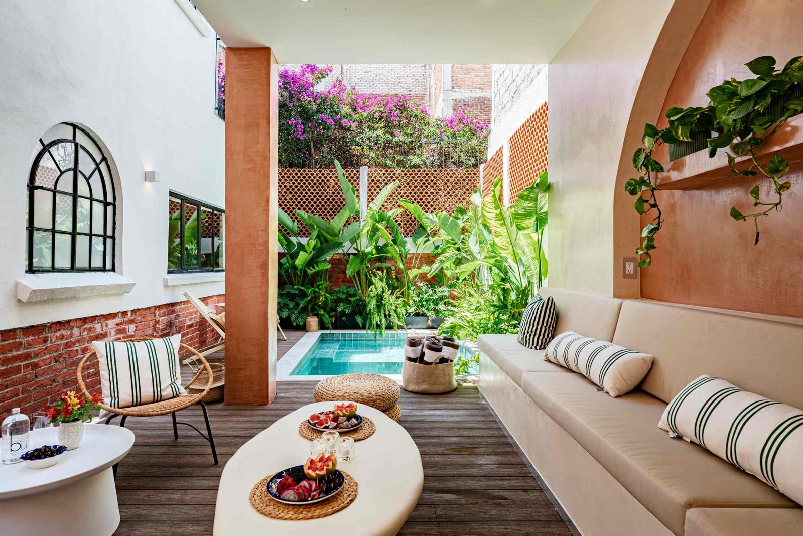 Casa Sombrerete Mexico City luxury villa rental with private plunge pool, outdoor lounge, and lush tropical courtyard.