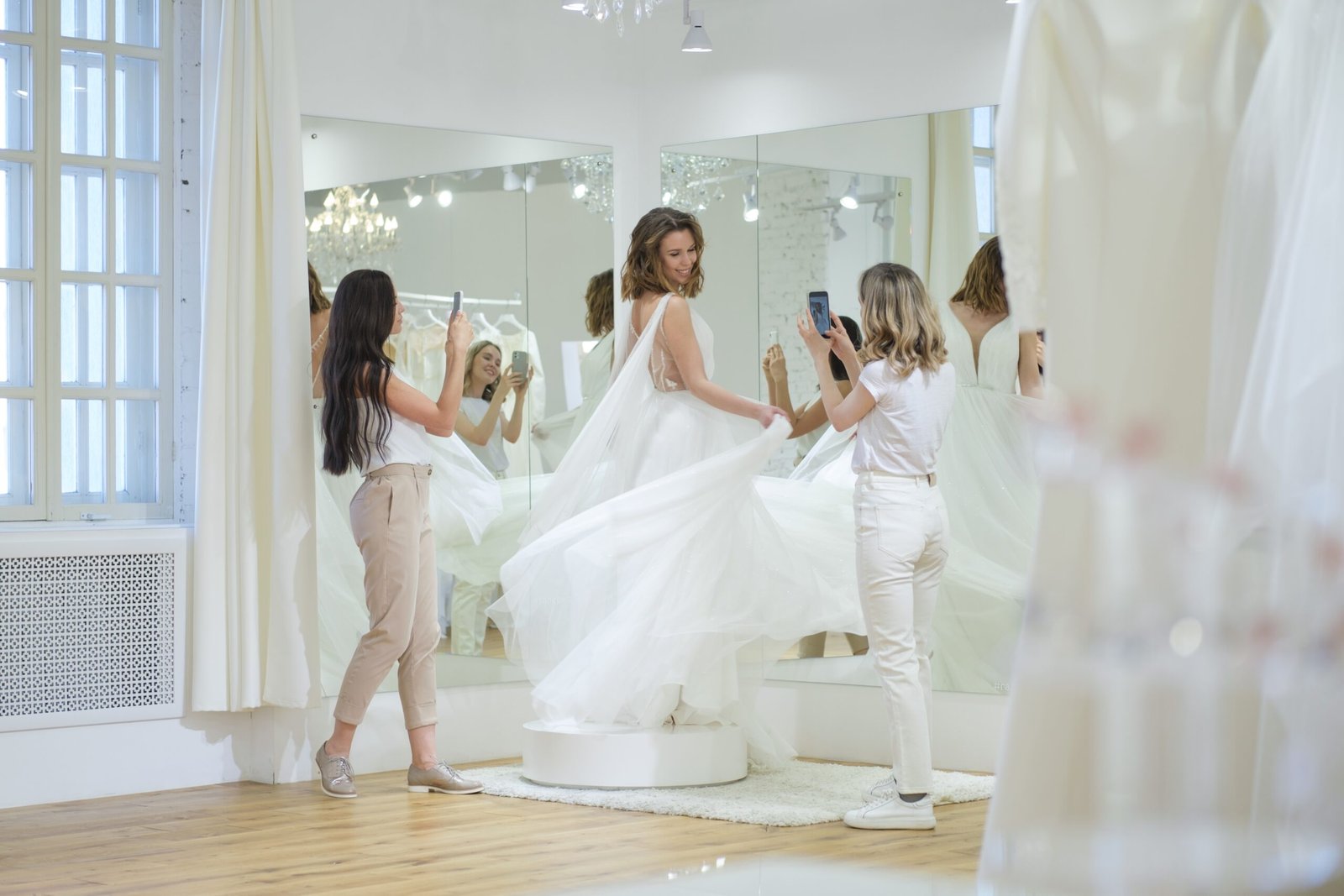 Bride trying on a wedding dress during a bridal fitting in Mexico City