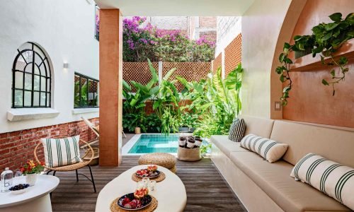 Casa Sombrerete Mexico City luxury villa rental with private plunge pool, outdoor lounge, and lush tropical courtyard.