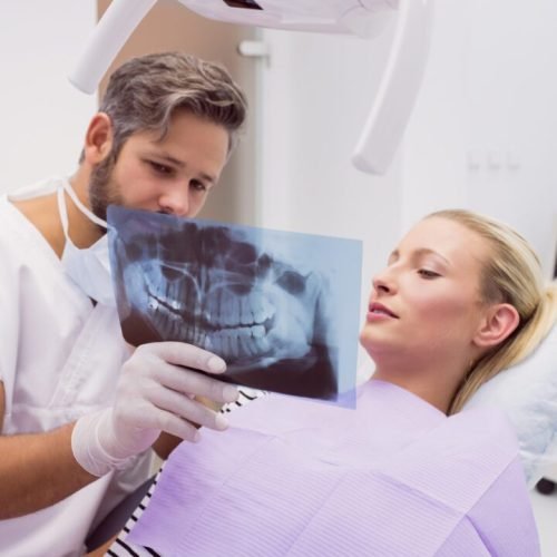 dentist-showing-x-ray-patient.jpg